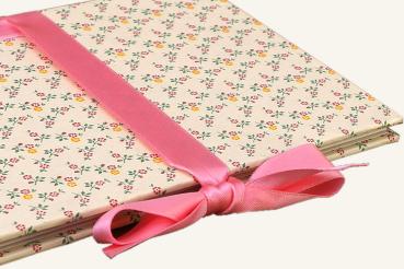 Small photo book with pink roses and green satin ribbon
